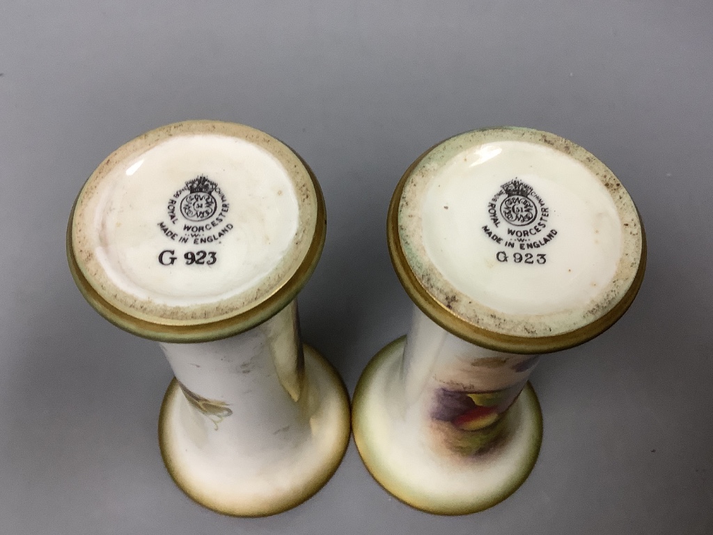 A pair of Royal Worcester fruit painted waisted vases, signed Maybury, height 17cm